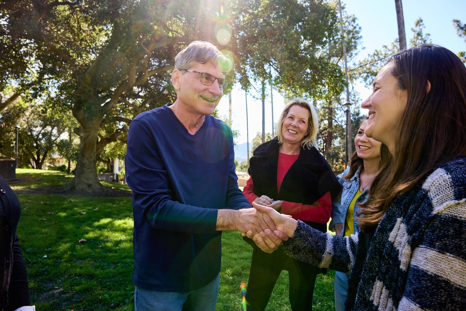 Scott greeting voters